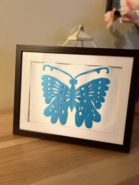 Blue butterfly paper cutting